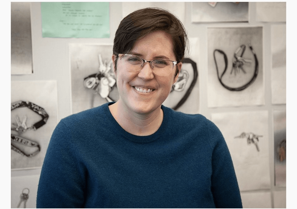 A photo of a smiling person and photos of keys in the background.